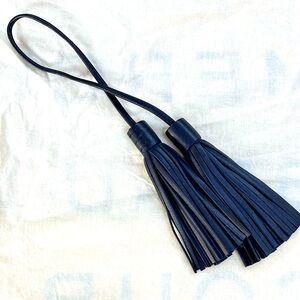 EUC MZ Wallace bag accessory/charm - dark navy blue tassels